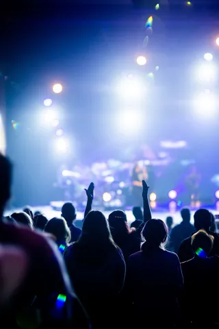 A festival crowd in front of a stage